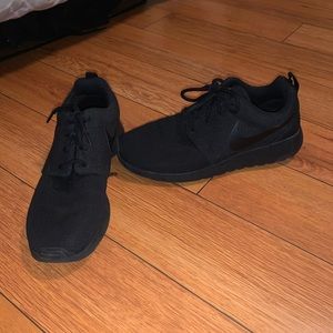 Black Nike running shoes
